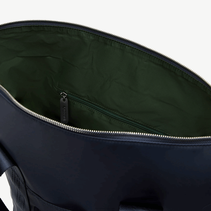 Жене контрастна торба са брендирањем 86882763 блеу нуит бланц м05 Lacoste