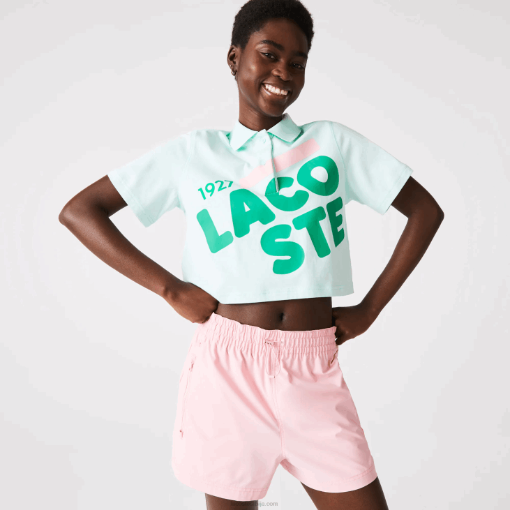 Жене лабав поло од органског памука са кратким принтом 86882526 тиркизно нре Lacoste