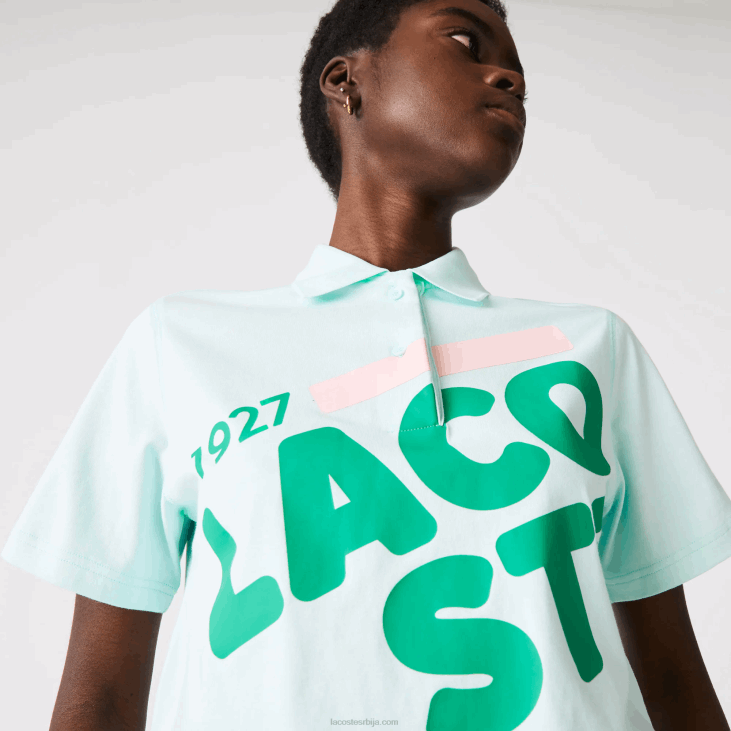 Жене лабав поло од органског памука са кратким принтом 86882526 тиркизно нре Lacoste