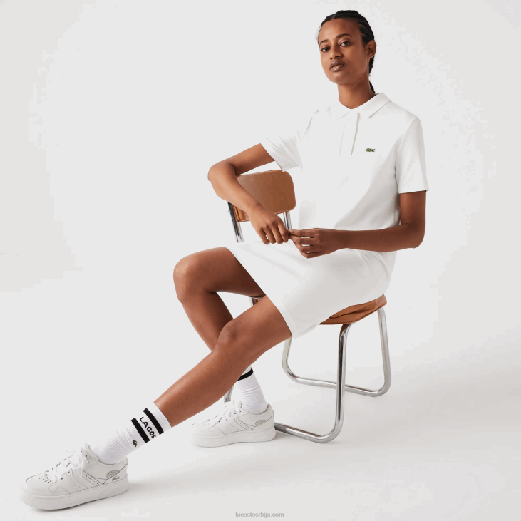 Жене Пикуе поло хаљина са трубачким рукавима 86882512 бела 70в Lacoste