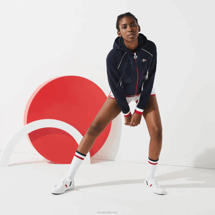 Жене спорт Френцх спортинг спирит едитион јакна од флиса са патент затварачем 86882610 тамноплава бела црвена закон Lacoste