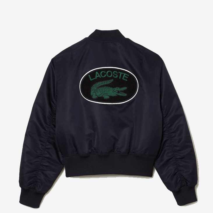 Жене прошивена најлонска јакна 86882623 тамноплава хде Lacoste