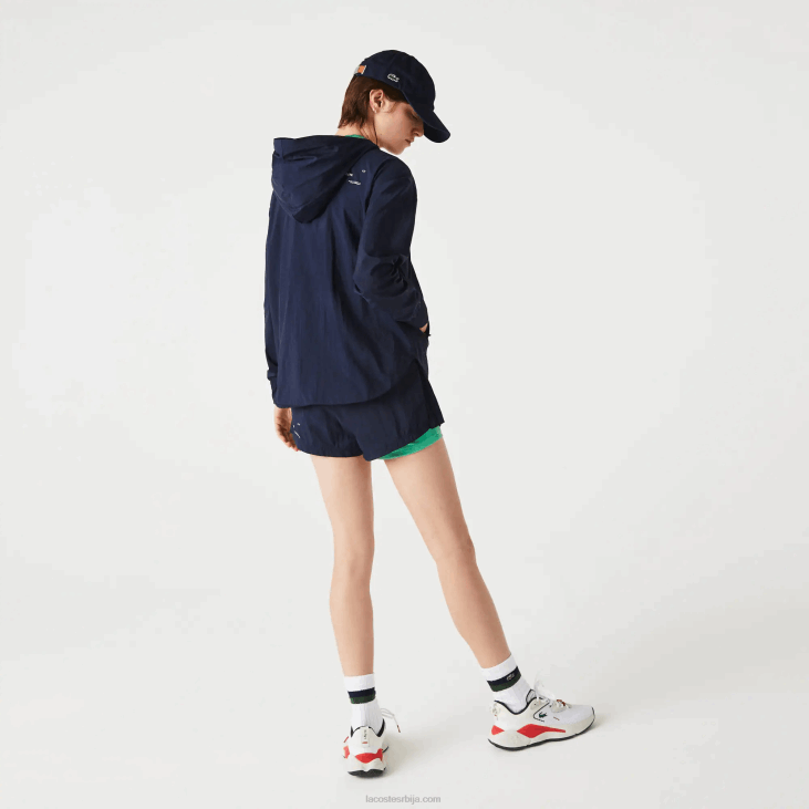 Жене спортска лагана најлонска и мрежаста јакна са патентним затварачем 86882633 тамноплава зелена бви Lacoste