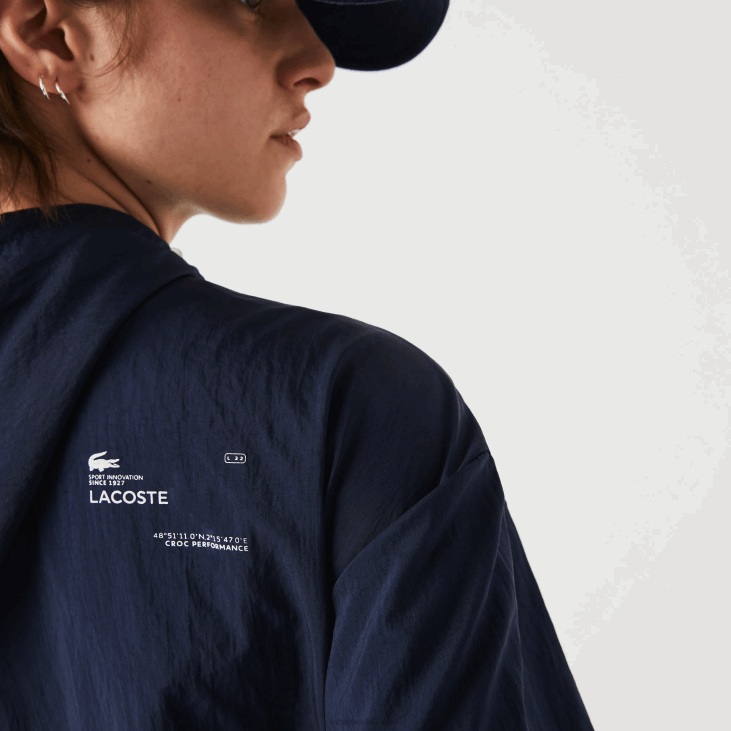 Жене спортска лагана најлонска и мрежаста јакна са патентним затварачем 86882633 тамноплава зелена бви Lacoste