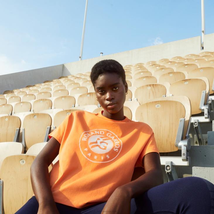 Жене спортска мајица слободног кроја Ролан Гарос 86882604 наранџасто бело фнф Lacoste