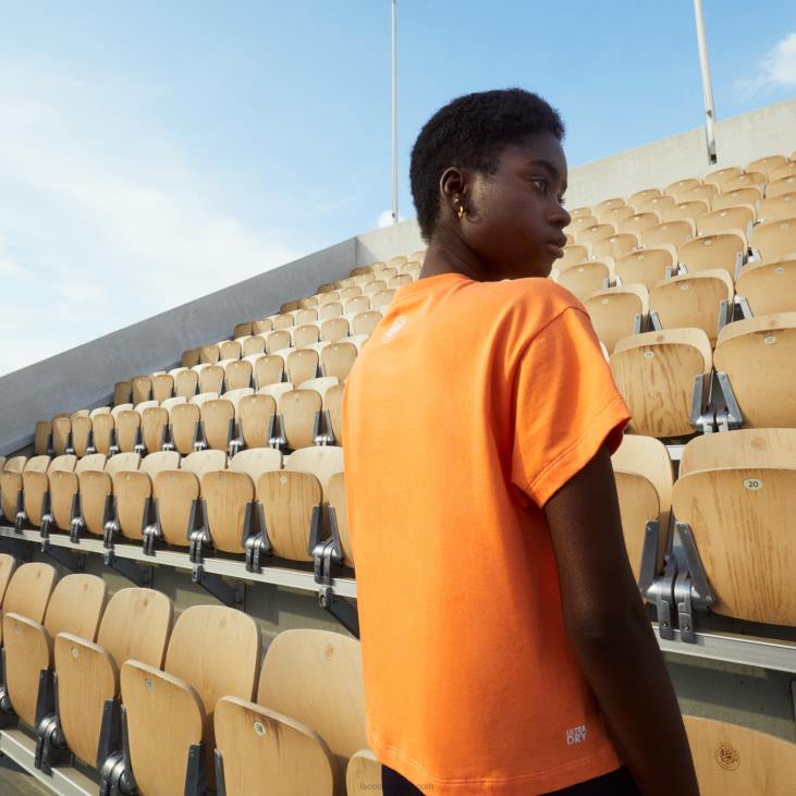 Жене спортска мајица слободног кроја Ролан Гарос 86882604 наранџасто бело фнф Lacoste