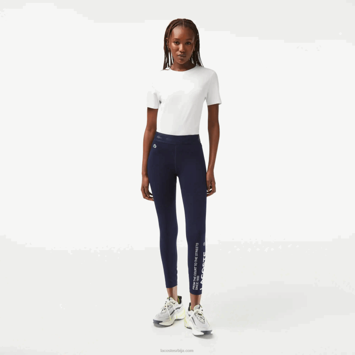Жене спортске хеланке од рециклираног полиестера дужине 7/8 86882408 тамноплава 166 Lacoste
