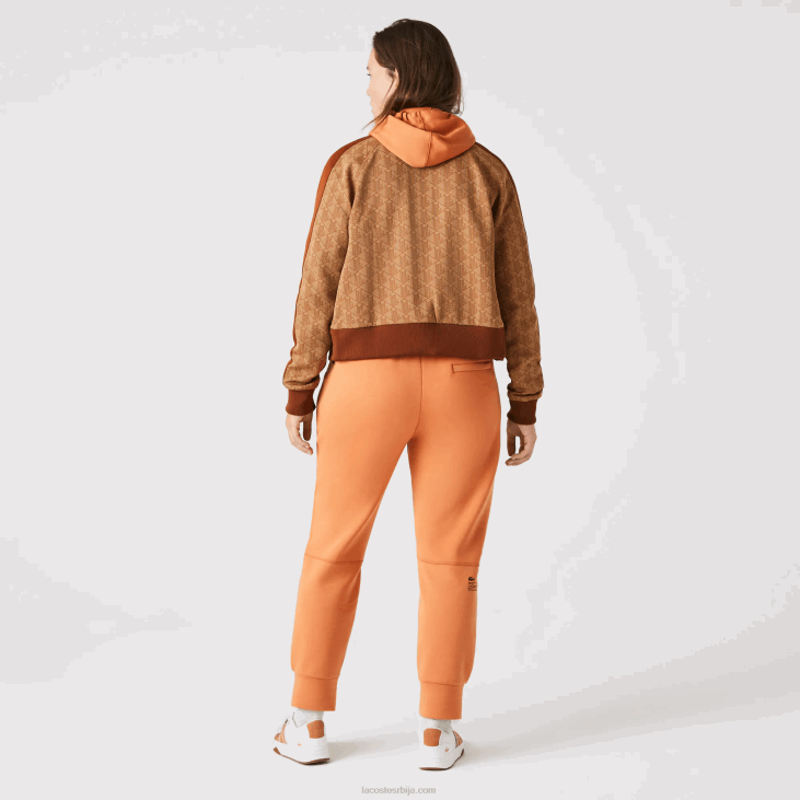 Жене памучне панталоне 86882405 наранџасти ввц Lacoste