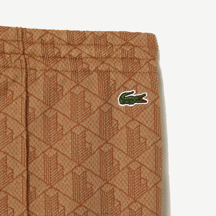 Жене панталоне са монограмом 86882536 беж браон звм Lacoste