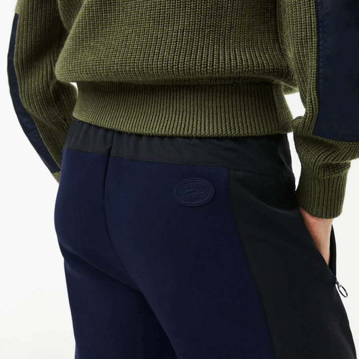 Жене панталоне у боји са ознаком 86882552 тамноплава црна р8п Lacoste