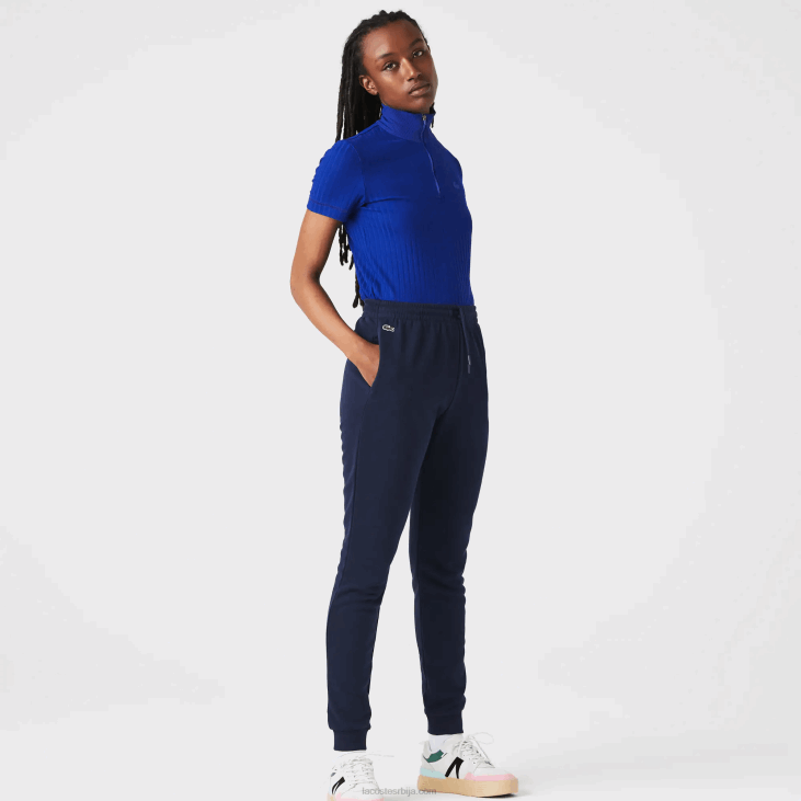 Жене лагане панталоне за трчање од флиса 86882593 тамноплава 166 Lacoste