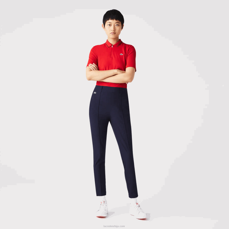 Жене спортске растезљиве панталоне за голф 86882658 тамноплава 166 Lacoste