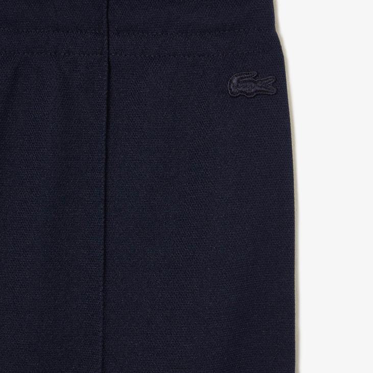 Жене лацосте к гооп двослојне пике панталоне 86882667 тамноплава 166