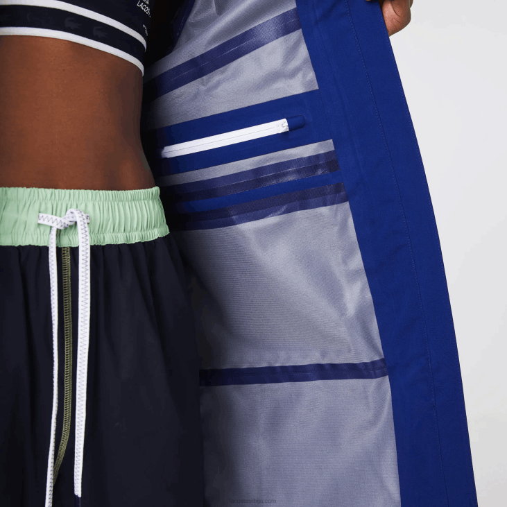 Жене дуга водоотпорна парка са капуљачом 86882628 блуе бдм Lacoste