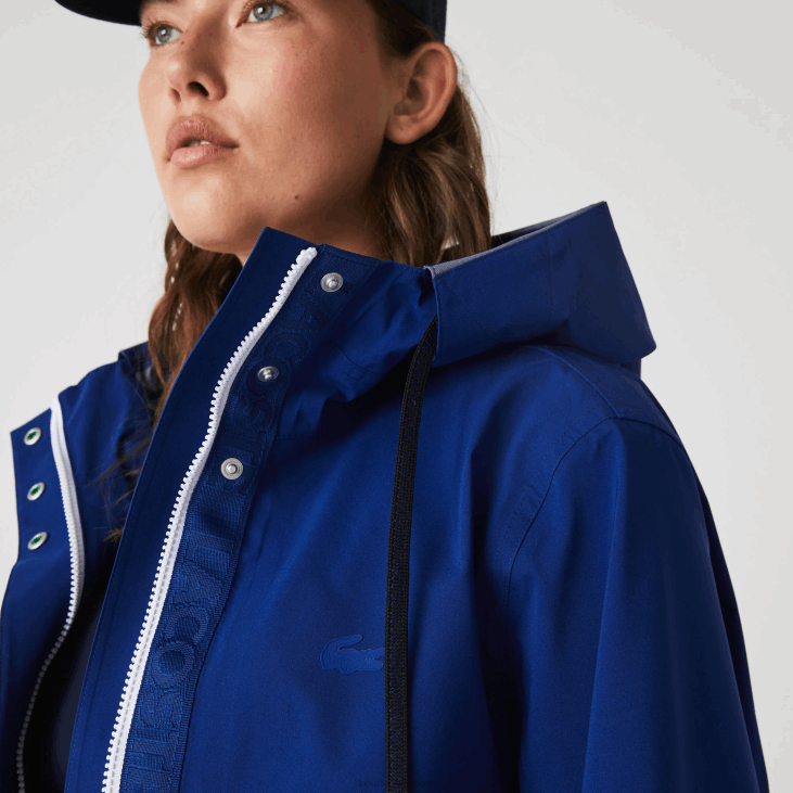 Жене дуга водоотпорна парка са капуљачом 86882628 блуе бдм Lacoste