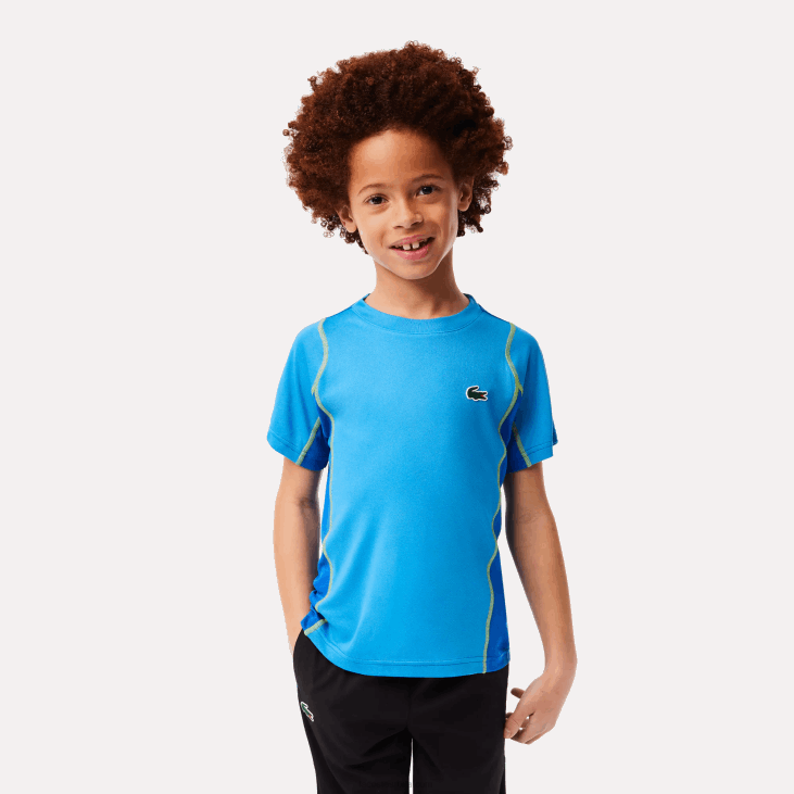 децаци тениска цолорблоцк пикуе мајица 86883009 плаво жути цдд Lacoste