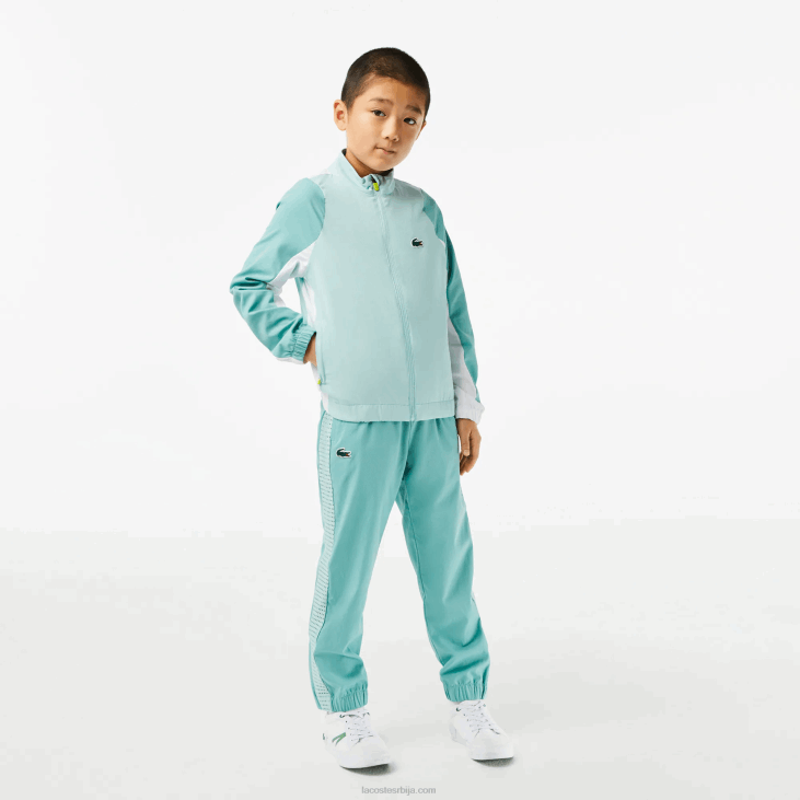 децаци тениски цолорблоцк јоггер сет 86883046 светло зелена бела жута киа Lacoste