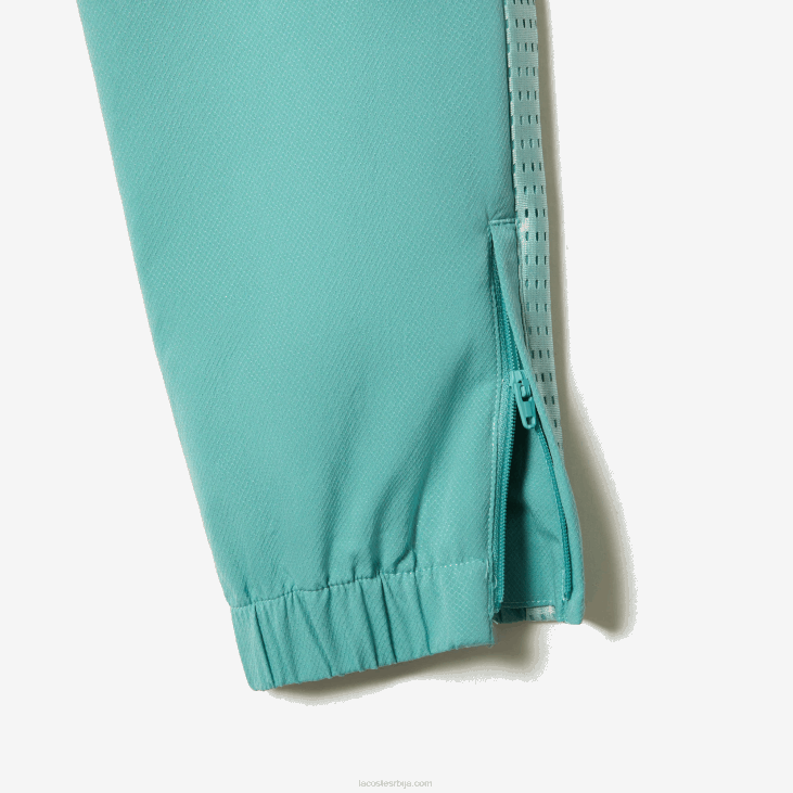 децаци тениски цолорблоцк јоггер сет 86883046 светло зелена бела жута киа Lacoste