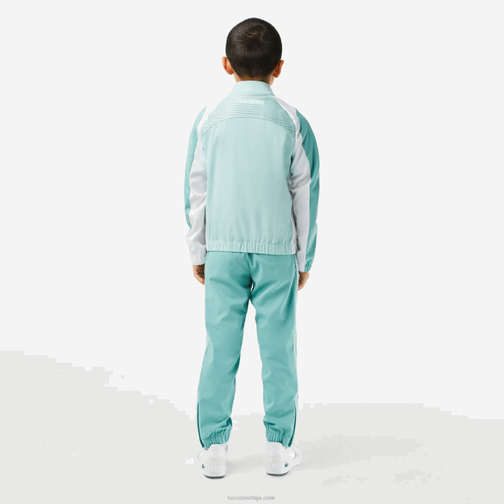 децаци тениски цолорблоцк јоггер сет 86883046 светло зелена бела жута киа Lacoste