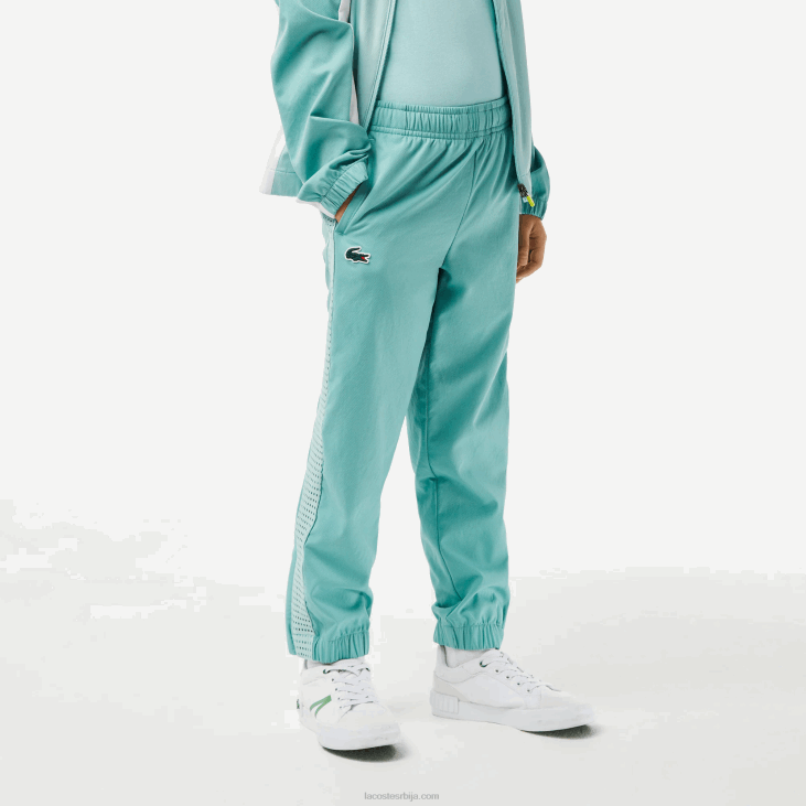 децаци тениски цолорблоцк јоггер сет 86883046 светло зелена бела жута киа Lacoste