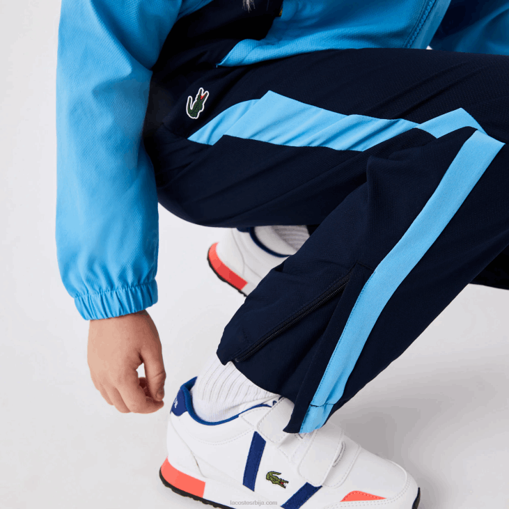 клинци спортска колор-блок тениска тренерка 86883186 тамноплава и25 Lacoste