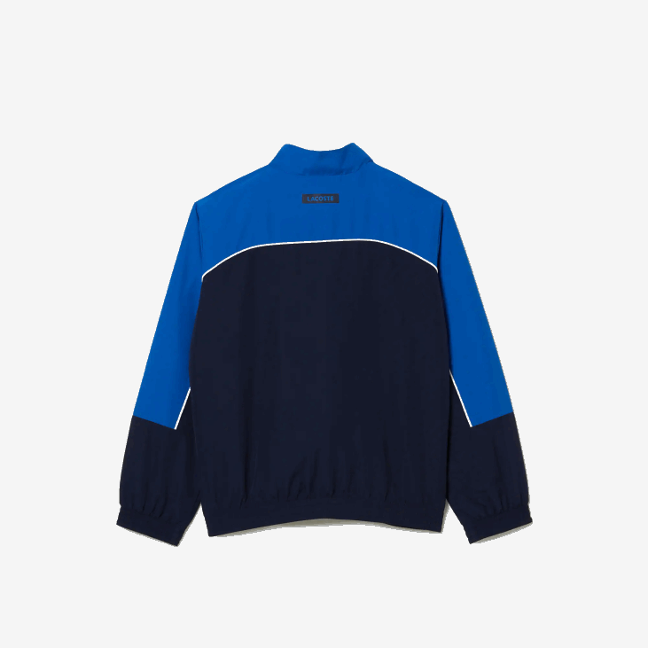 децаци спортска колор-блок тренерка 86883209 тамноплава 976 Lacoste