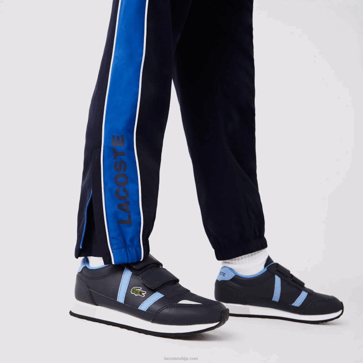 децаци спортска колор-блок тренерка 86883209 тамноплава 976 Lacoste