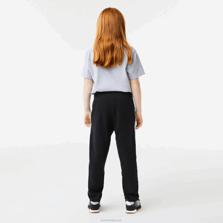 клинци панталоне са штампаним тракама 86883223 црно плава 985 Lacoste