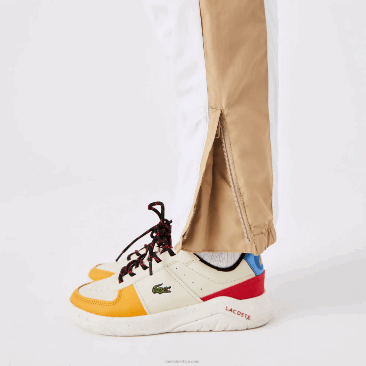 клинци панталоне са контрастним тракама 86883224 бело беж вн5 Lacoste