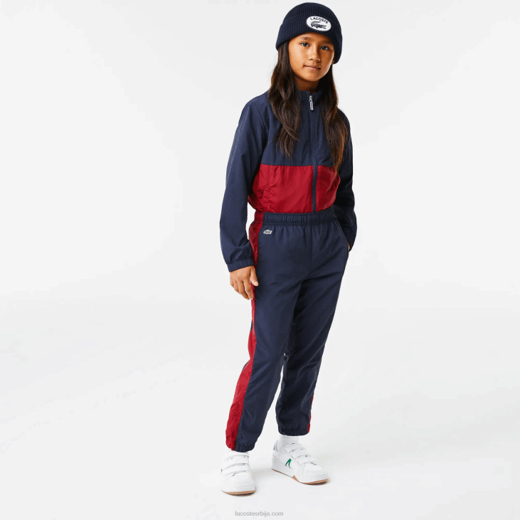 клинци панталоне са контрастним тракама 86883225 тамноплави бордо луб Lacoste