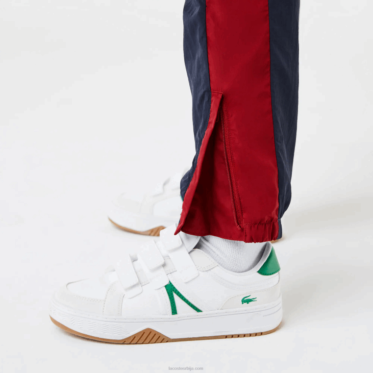 клинци панталоне са контрастним тракама 86883225 тамноплави бордо луб Lacoste