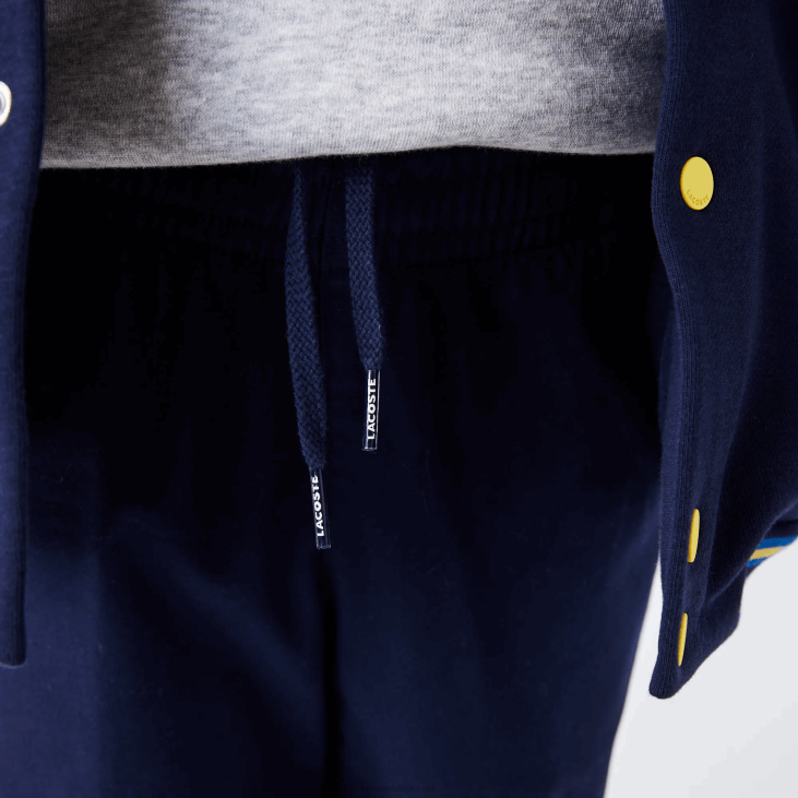 децаци памучне памучне цхинос од растезљивог габардина 86883269 тамноплава 166 Lacoste