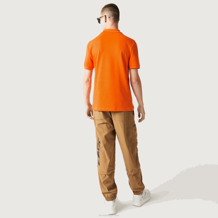 мушкарци оригинал л.12.12 слим фит поло 8688876 наранџаста з4д Lacoste
