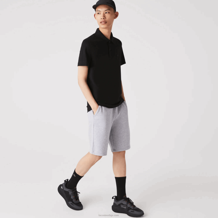 мушкарци активно кретање прозрачно памучно пике поло 8688173 црна 031 Lacoste