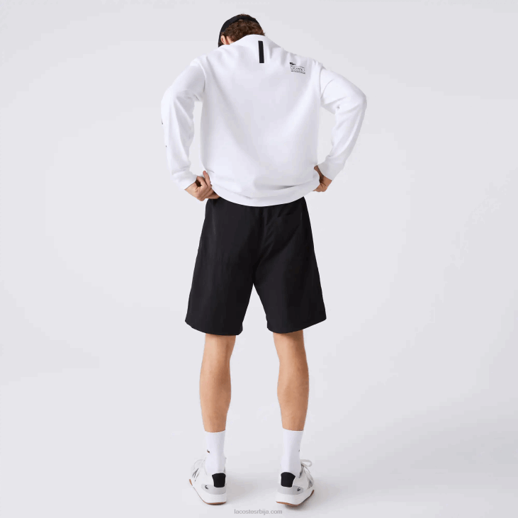 мушкарци Шортс са патцхворк ефектом у боји 86881500 црно плаво бело се1 Lacoste