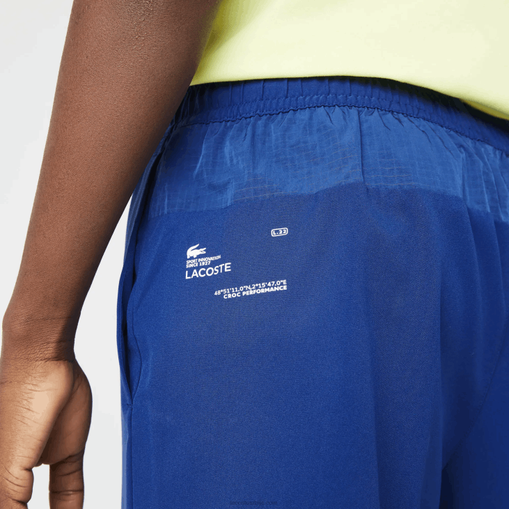 мушкарци спортски слојевити шортс 86881544 плава блиставо жута бела 8к6 Lacoste