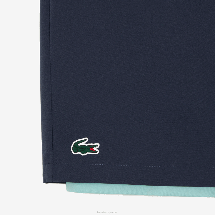 мушкарци двобојни спортски шортс са уграђеним гаћама 8688480 плава светло зелена б00 Lacoste