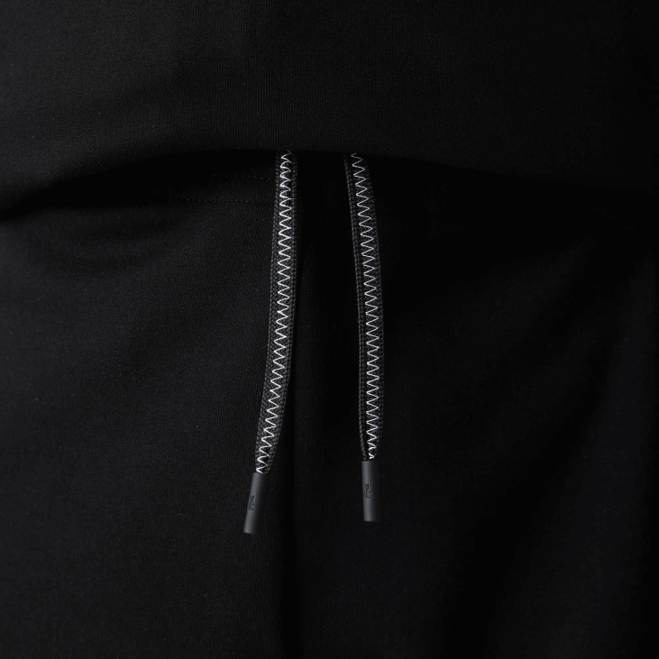 мушкарци панталоне са рефлектујућим принтом 86881043 црна 031 Lacoste