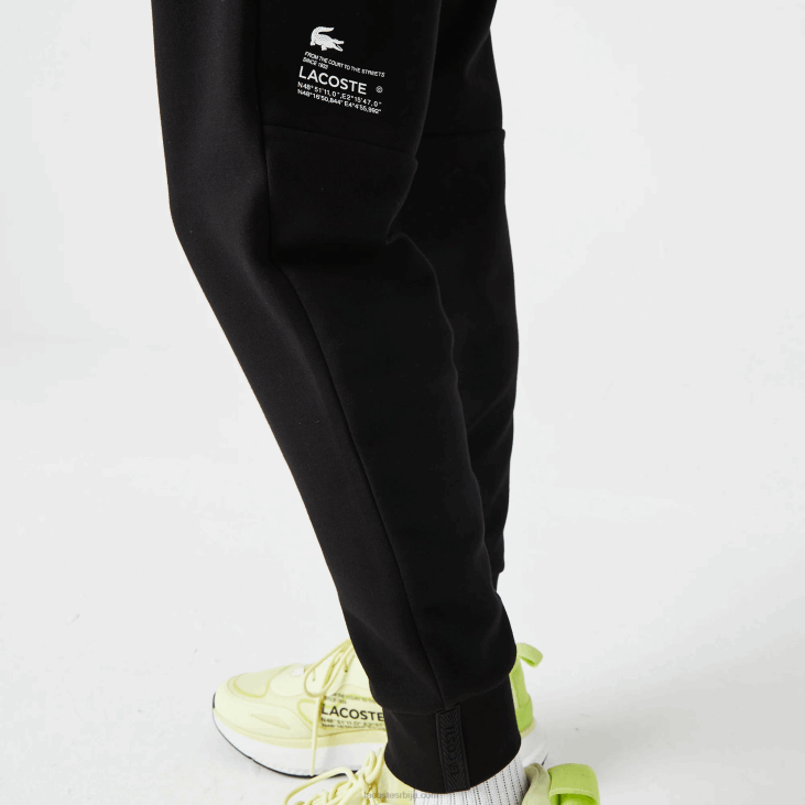 мушкарци панталоне са рефлектујућим принтом 86881043 црна 031 Lacoste