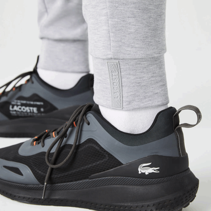 мушкарци панталоне са рефлектујућим принтом 86881044 сиви кине цца Lacoste