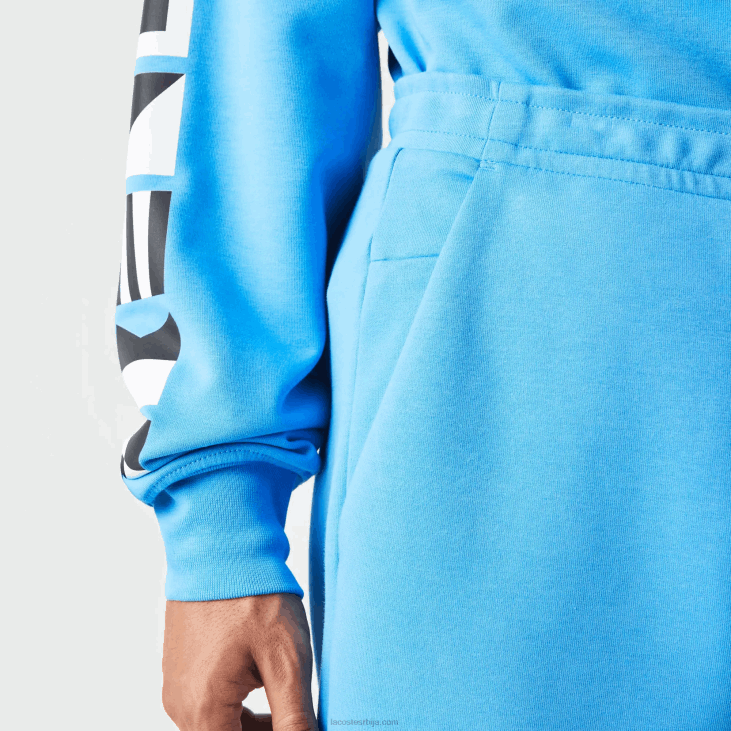 мушкарци панталоне са рефлектујућим принтом 86881045 плава 4ка Lacoste