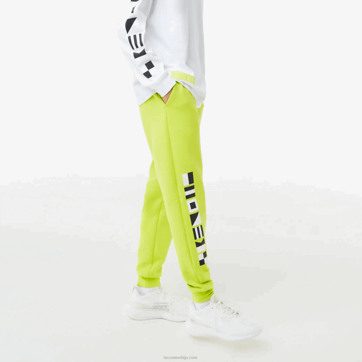 мушкарци панталоне са рефлектујућим принтом 86881046 жута 90в Lacoste