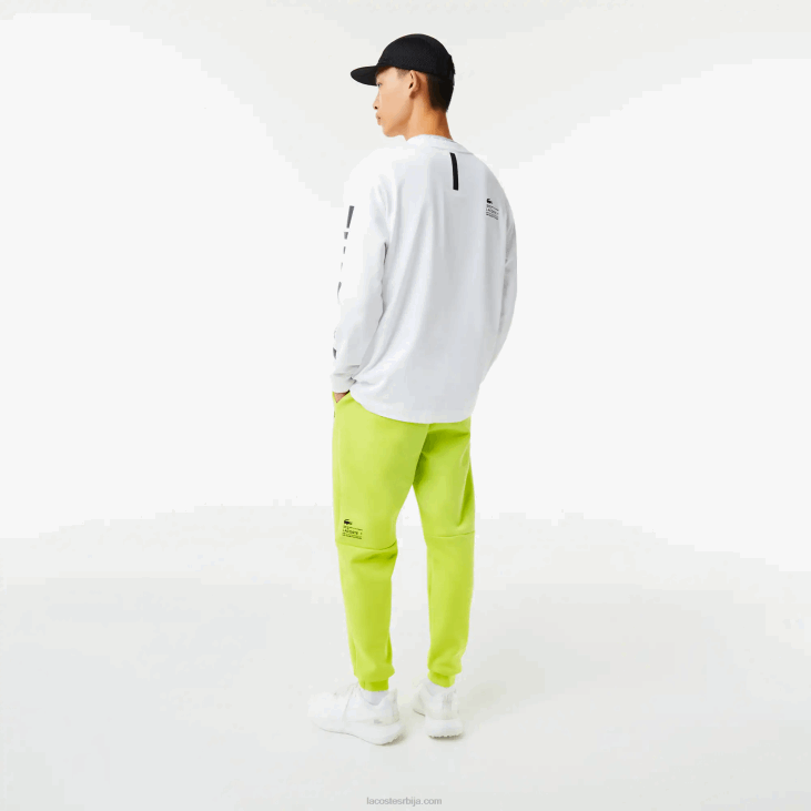 мушкарци панталоне са рефлектујућим принтом 86881046 жута 90в Lacoste