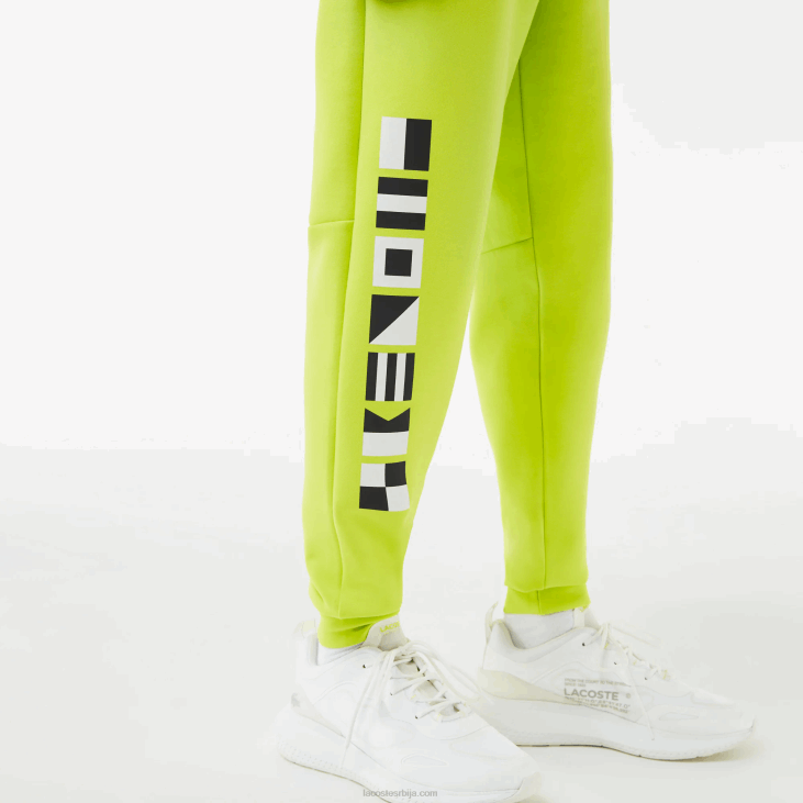 мушкарци панталоне са рефлектујућим принтом 86881046 жута 90в Lacoste