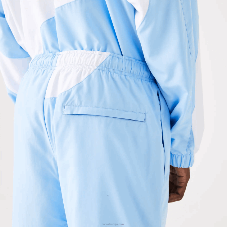 мушкарци панталоне са графиком наслеђа 86881071 плаво бела е7б Lacoste