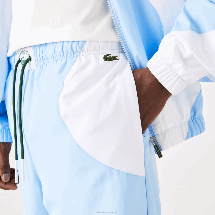 мушкарци панталоне са графиком наслеђа 86881071 плаво бела е7б Lacoste