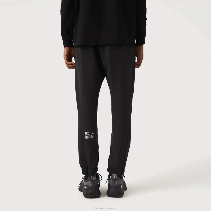 мушкарци спортске доње панталоне са рајсфершлусом 86881091 црна ц31 Lacoste