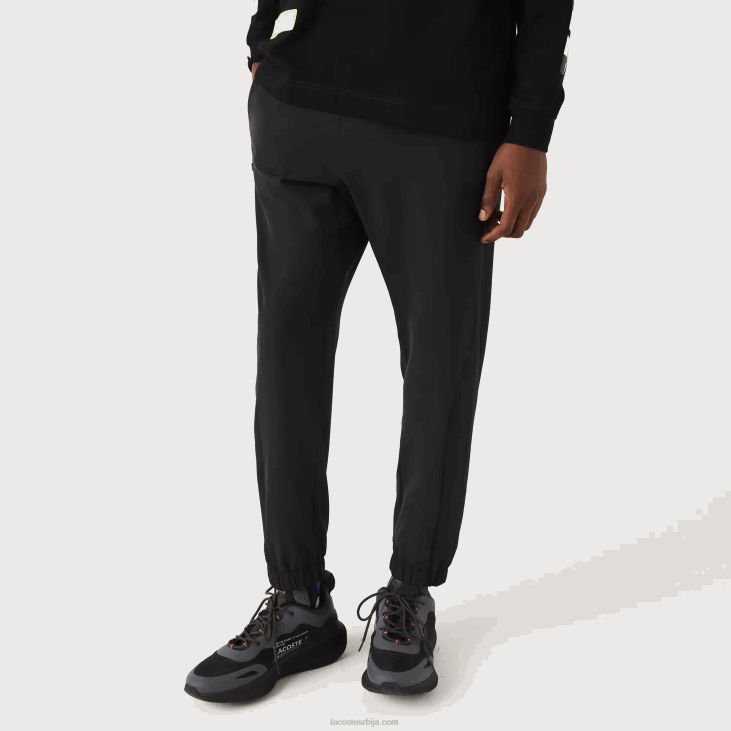 мушкарци спортске доње панталоне са рајсфершлусом 86881091 црна ц31 Lacoste