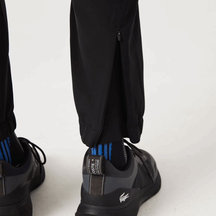 мушкарци спортске доње панталоне са рајсфершлусом 86881091 црна ц31 Lacoste