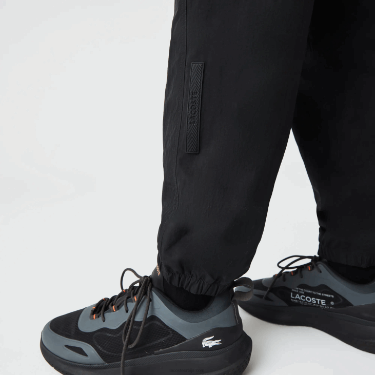 мушкарци херитаге панталоне у колор блоку регуларног кроја 86881110 црно жута н07 Lacoste